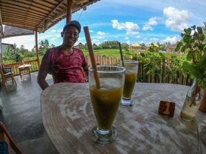 Pande the owner made a healing juice with the ingridients from his garden. at Vegan Healing Garden in Ubud