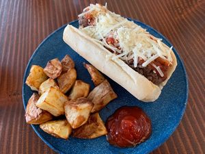 “Meatball” hero with cheez & air fried potatoes   at Feel Good Smoothie Bar and Cafe in Oneonta