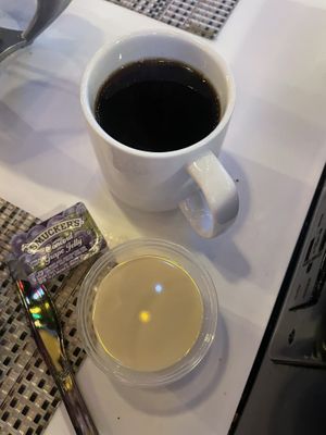 Coffee with side of oat milk.  They also have almond and soy.  at IAH -El Premio - Terminal E in Houston