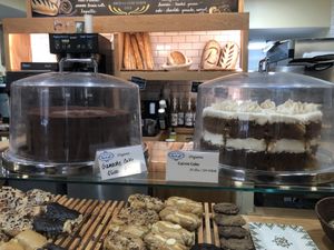 Chocolate ganache cake and carrot cake priced by slice and whole cake at Breads On Oak - Carondelet St in New Orleans