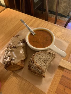 Tomato soup and the cinnamon + nuts twister 😋   at Breads On Oak - Carondelet St in New Orleans