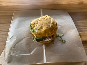 Breakfast biscuit with eggs and sausage (all vegan) at Breads On Oak - Carondelet St in New Orleans