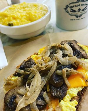 Creole omelette toast and cheese grits  at Breads On Oak - Carondelet St in New Orleans