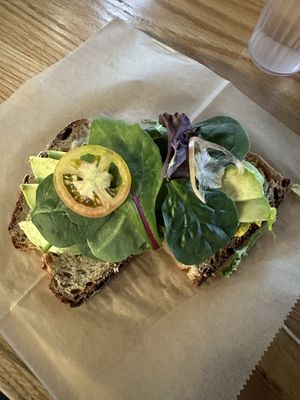 Avocado toast with tofu scramble. It was delicious   at Breads On Oak - Carondelet St in New Orleans