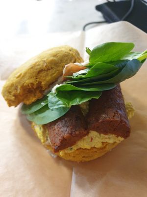 Cheddar biscuit with tofu scramble and andouille sausage at Breads On Oak - Carondelet St in New Orleans