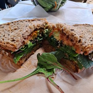 TLTA: House Marinated Tempeh, Avocado, Tomato, Organic Greens, Aioli, Organic Multigrain bread that is baked in-house 😋 at Breads On Oak - Carondelet St in New Orleans