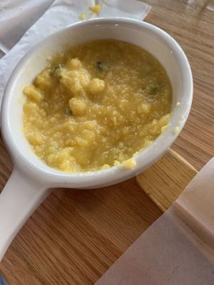 Amazing grits!  at Breads On Oak - Carondelet St in New Orleans