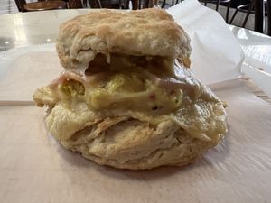 Egg O’Vegan- Breakfast sandwich with tofu scramble, bacon, and cheese. Served warm on an organic, house-made buttermilk biscuit.   at Breads On Oak - Carondelet St in New Orleans