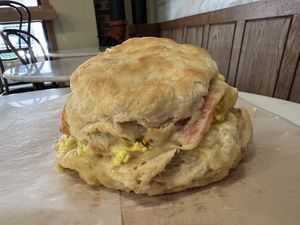 Egg O’Vegan- Breakfast sandwich with tofu scramble, bacon, and cheese. Served warm on an organic, house-made buttermilk biscuit.   at Breads On Oak - Carondelet St in New Orleans