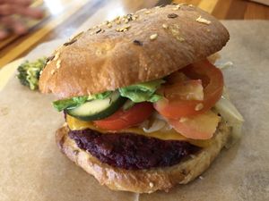 Big daddy burger with house beer & mushroom patty at Breads On Oak - Carondelet St in New Orleans