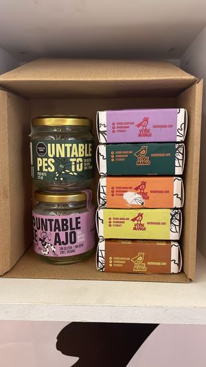 Caja llena de deliciosos quesos y Untables veganos   at Verde Mango in Bogota