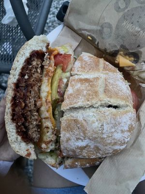 ‘Le Vegan’ vegan steak burger, hash brown, vegan cheese, crispy onion bits, salad & tomatoes with BBQ sauce 😋 it a proper crust roll, incredible!  at Poco Loco in Chamonix-mont-blanc