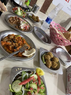 Green salad, aubergine, foul, falafel, breadd  at Mohamed Ahmed in Alexandria