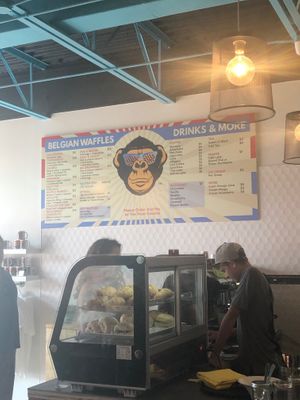 Jacob serving customer  at Waffle Monkey in George Town