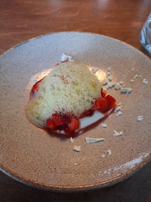 Dessert strawberriesalad with vanillacream and (libbsticka) on top. Marvellous! at Bellies in Stavanger