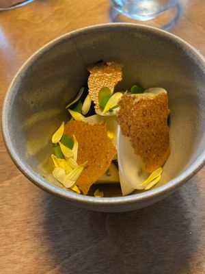 Turnip discs & wedges with rye crisps, charred baby leek and fermented lemon at Bellies in Stavanger
