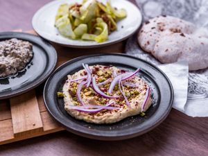 We serve hummus and woodfired pita at Bellies in Stavanger