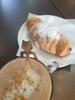 Warm chocolate croissant and soy Cappuccino at Moko Veggie Café - Alvalade in Lisbon