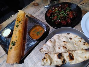 Delicious masala dosa and Gobi Manchurian with naan at Namaste@OMNOM in North London