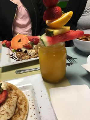 Orange juice and the (complete) vegan waffle at Karine's in Toronto