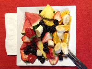 Over the top fruits and veggies on top of your main choice at Karine's in Toronto