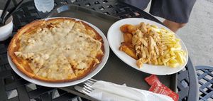 Cauliflower crust pizza and vegan chicken at Carotenos in Ponce