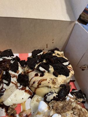 Chocolate Peanut Butter Cinnamon Roll (PB Frosting, Brownie Bites, Oreo Bites, and Chocolate Sauce)  at Cinnaholic  in Cary