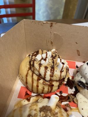 S’more’s Cinnamon Roll (Marshmallow Frosting, Marshmallows, Graham Cracker, and Chocolate Sauce)  at Cinnaholic  in Cary