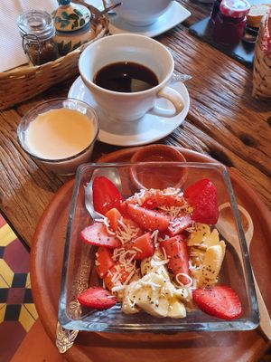 Fruit bowl with homemade granola and soy milk at Cafe Bohème   in Antigua