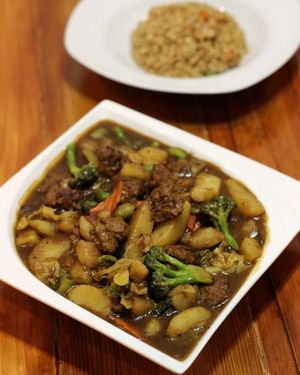 Potato Curry with a side of fried rice at V.L.C Vegan Eatery in Orlando