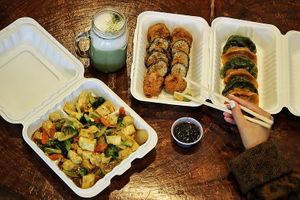 Tofu curry, V crunch roll, V.L.C.  Dumplings, organic matcha latte at V.L.C Vegan Eatery in Orlando