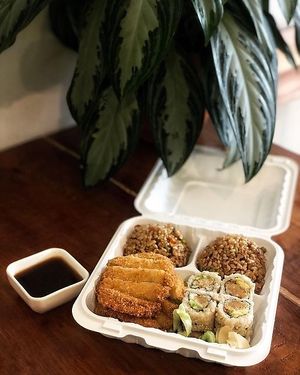 4 item combo: curry fried rice, chick’n fried rice, eggplant katsu, chick’n tempura roll at V.L.C Vegan Eatery in Orlando