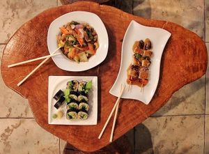 Vegetable nut medley, chick’n skewers, green roll at V.L.C Vegan Eatery in Orlando