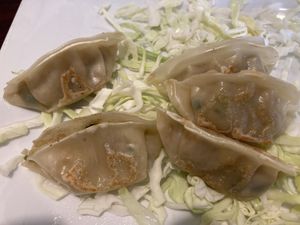 Dumplings -12 on a plate but I did not take photo fast enough because they are so delicious.  at Amitabul in Chicago