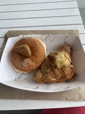 Almond and pistachio croissant and biscoff donut.   at Farine Bakery - Red Hill in Red Hill