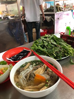 Pho! With tons of friendly extras  at Pho Chay Nhu in Ho Chi Minh City