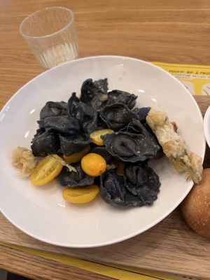 vegan option changes weekly! Black tortellini with potatoes & leek in ginger oil. Not super flavourful despite the strong ingredients   at Sfoglia Rina in Bologna