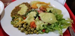 Loved the avocado dressing so much I drenched everything in it! at Govinda's Vegetariano in Cuenca