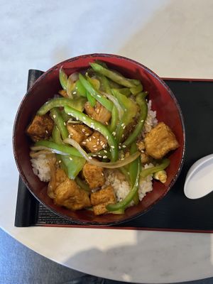Sticky sweet sesame tofu donburi bowl  at Pompoko in Brighton