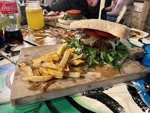 Veggie burger with sandwich bun as the burger bun is not vegan at Meraki in Salento