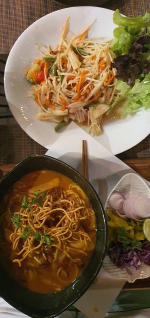 Khao soi and papaya salad at Downtown - Vegan Garden Restaurant in Chiang Mai