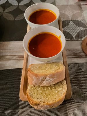 Tomato soup split 2 ways with garlic bread  at Downtown - Vegan Garden Restaurant in Chiang Mai