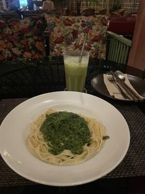 Pesto pasta and matcha lattee  at Downtown - Vegan Garden Restaurant in Chiang Mai
