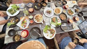 Table full of happiness   at Downtown - Vegan Garden Restaurant in Chiang Mai
