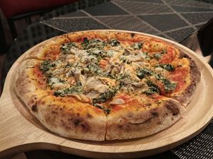 Spinach and cheese pizza, large (250 THB)  at Downtown - Vegan Garden Restaurant in Chiang Mai