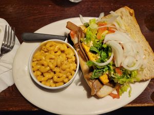 Po boy special with plantains and side of Mac and Cheese at The Chicago Diner - Lakeview in Chicago