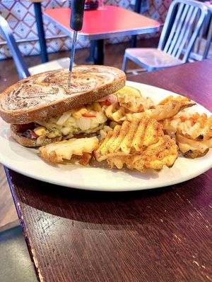 Reuben plate with waffle fries   at The Chicago Diner - Lakeview in Chicago