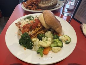 vegan lasagna bolognese with garlic bread and seasoned vegetables   at The Chicago Diner - Lakeview in Chicago