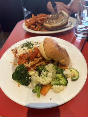 vegan lasagna bolognese with garlic bread and seasoned vegetables   at The Chicago Diner - Lakeview in Chicago