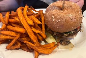 cajun black bean burger with sweet potato fries as a side   at The Chicago Diner - Lakeview in Chicago